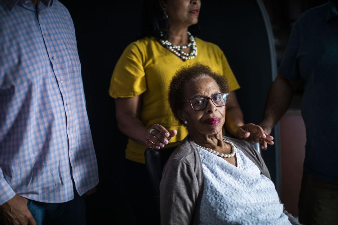 long term care KFF Thomas Elderly woman in wheelchair, with relatives