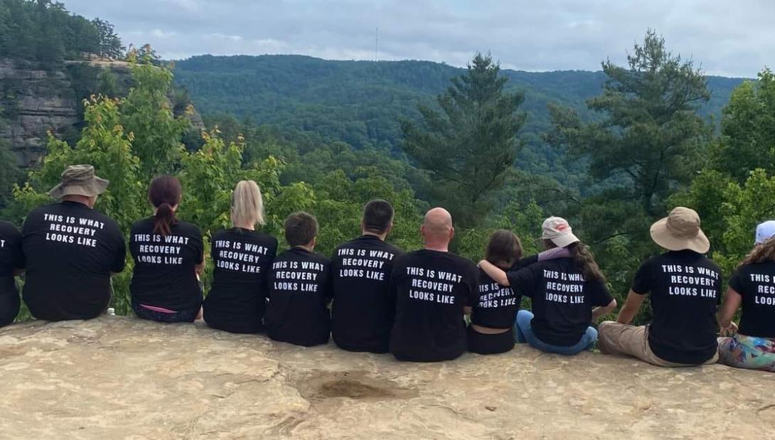 Members of Young People in Recovery in Kentucky look out over the mountains. Members of Young People in Recovery in Kentucky look out over the mountains.