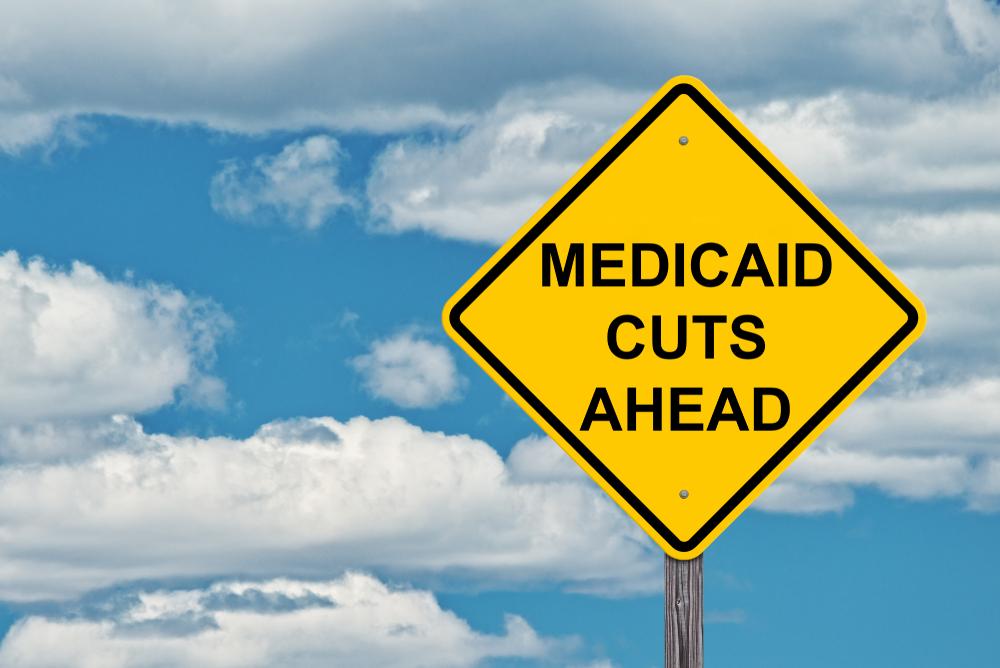 Street sign Medicaid Cuts Ahead Street sign Medicaid Cuts Ahead