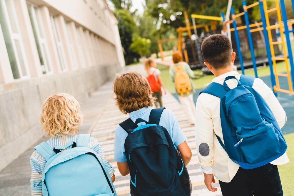 kids going to school with backpacks kids going to school with backpacks