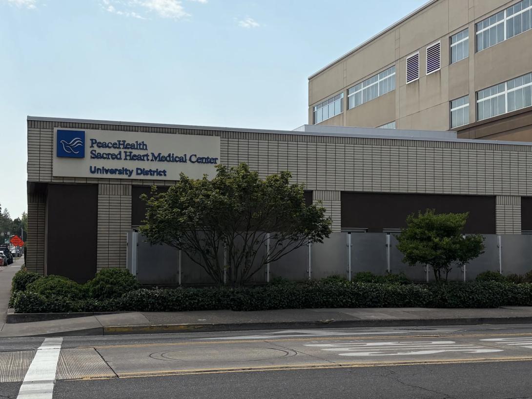 One of the University District PeaceHealth hospital buildings on 11th Avenue and Alder Street that will be acquired by Bushnell University, pictured on Aug. 26, 2025.