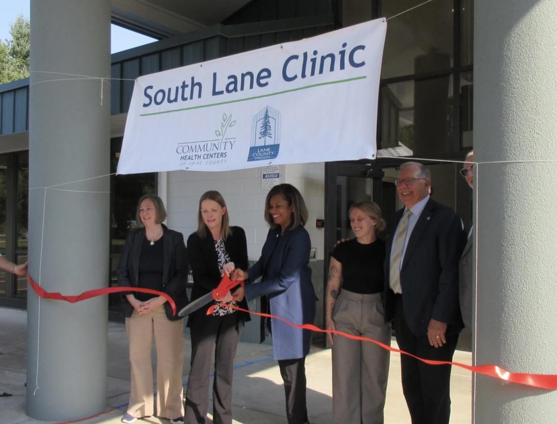 The ribbon cutting for the South Lane Clinic took place on Aug. 28, 2025. Speakers at the event included Lane County commissioner Heather Buch (left), Health and Human Services director Eve Gray, Lane Community College president Stephanie Bulger, Caitlyn McCabe (healthcare aide for U.S. Rep. Val Hoyle), and "Be Your Best" co-founder Jim Gilroy.
