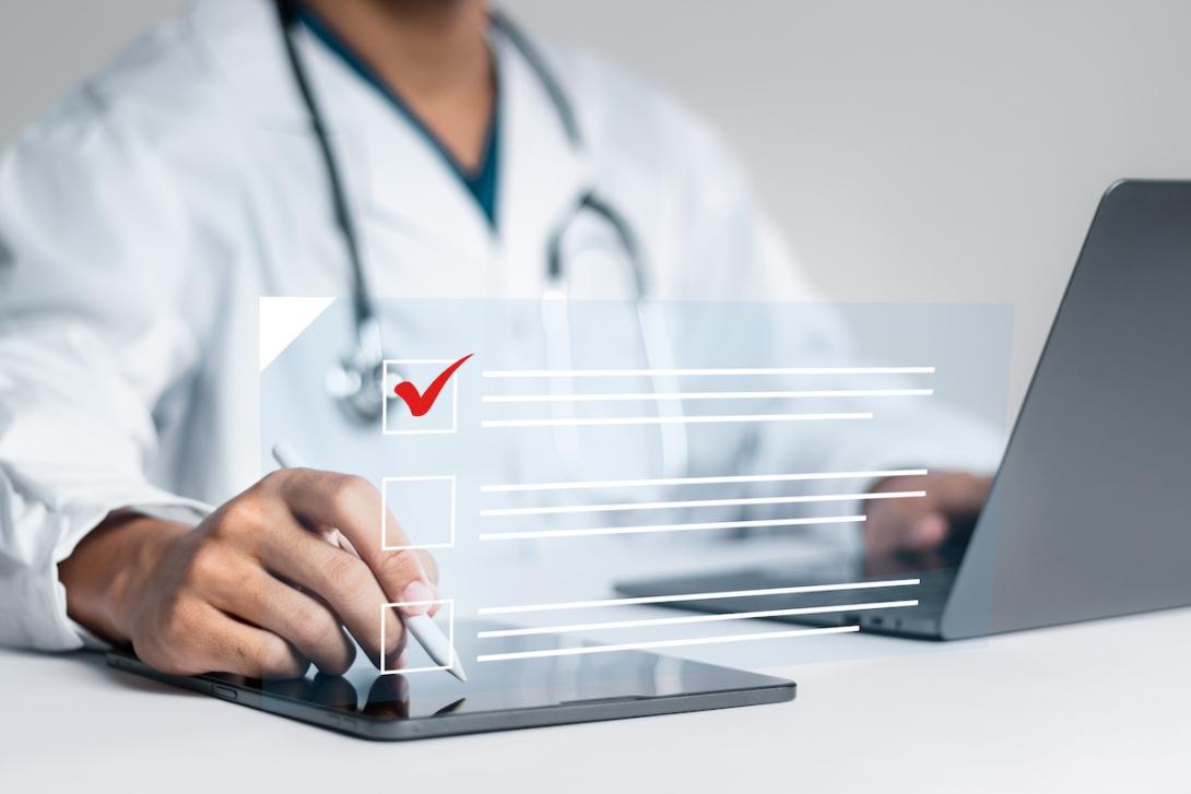 Doctor checks a list