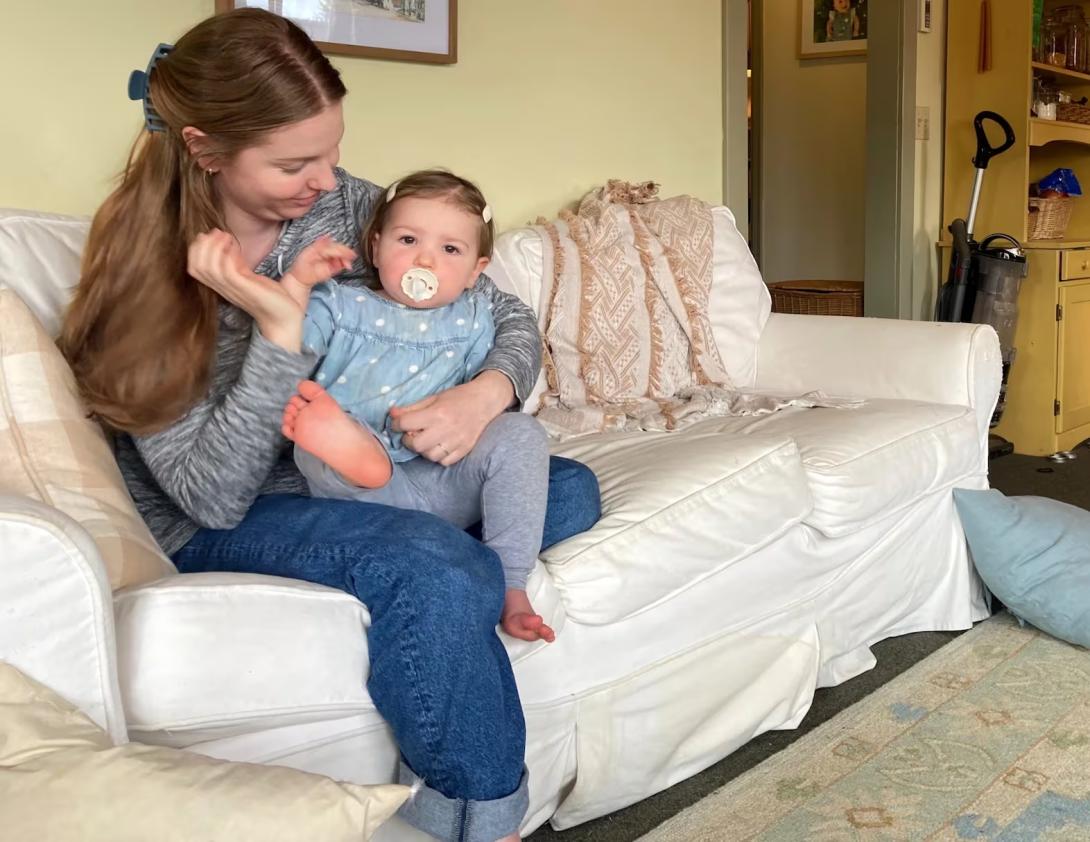 Abbie Reed and her daughter, Clara at Reed's home in Wheeler, Ore. on Oct. 22, 2025.  Rachel Miller-Howar / Northwest News Network