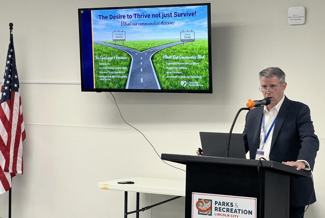 Marty Cahill of Samaritan Health Services explains the proposal to be absorbed into MultiCare