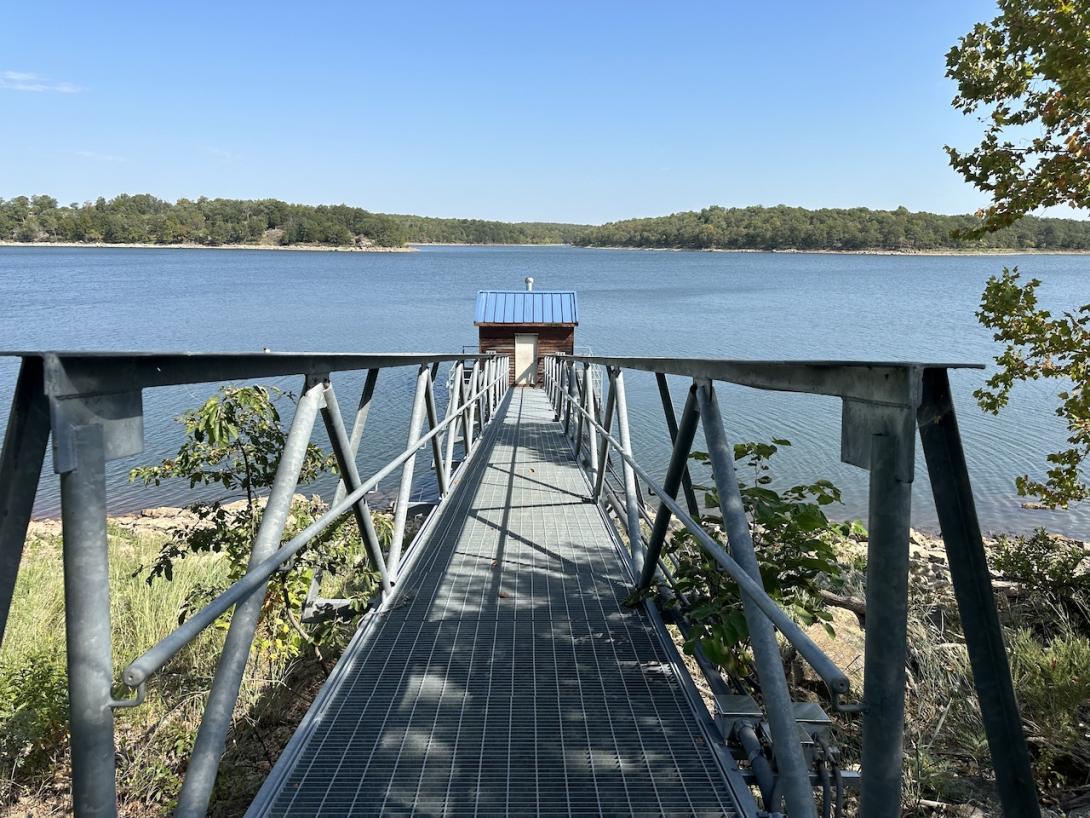 A metal gangway leads to the floating pumphouse used to harvest water for Public Wholesale Water Supply District 20 outside Sedan, Kan. 
