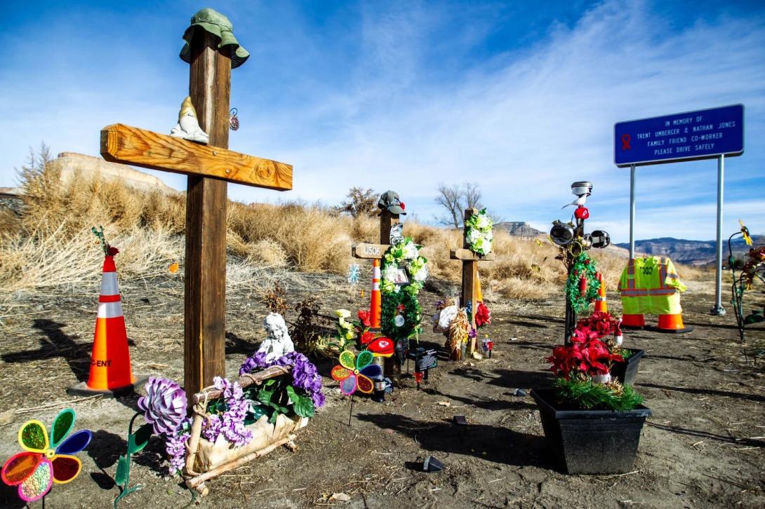 A memorial on the roadside near Palisade, Colo., where two workers were killed by a driver with drugs in his system.