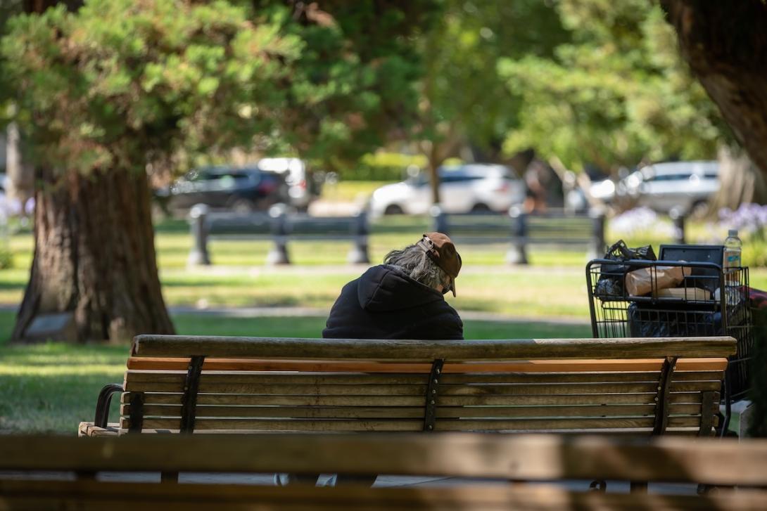 homeless man on bench